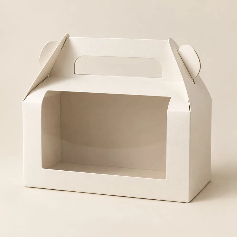 Boîte d'emballage pliable avec poignée de transport intégrée